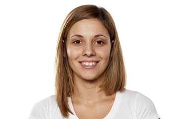 smiling young woman without make-up