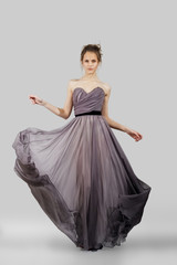 Fototapeta premium young lady posing in fashion dress