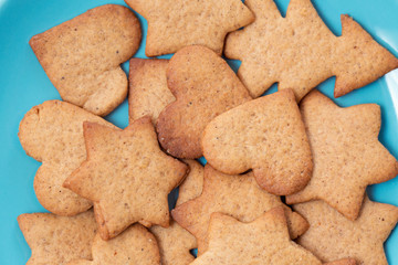 Tasty homemade cookies on blue plate