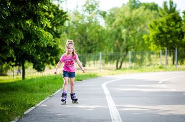 Girl roller-skating in the park