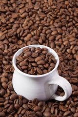 Coffee beans and cup of coffee