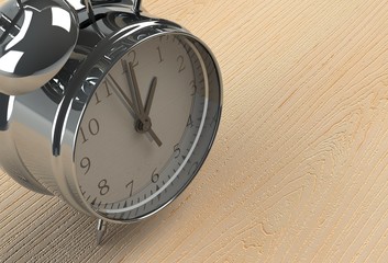  Silver alarm clock on wooden table