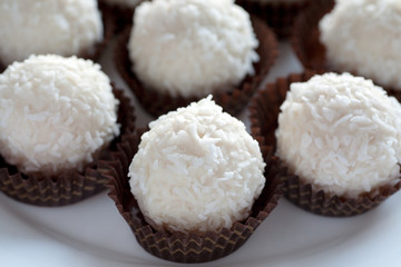 White coconut candys in decorative tray