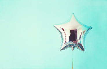 star balloon of success on colorful background