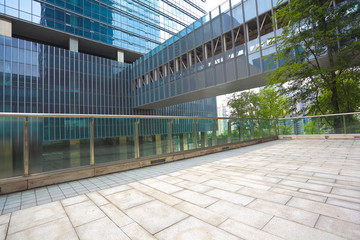 Empty road floor with modern building background