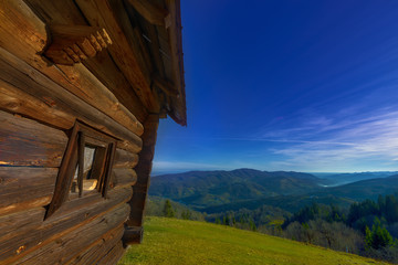 wooden hut on the mountain hills