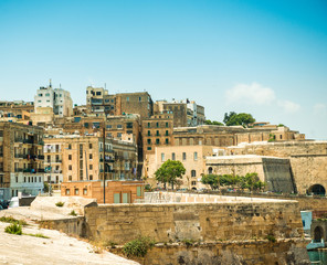 Fototapeta na wymiar houses and roofs of Valletta in Malta from high