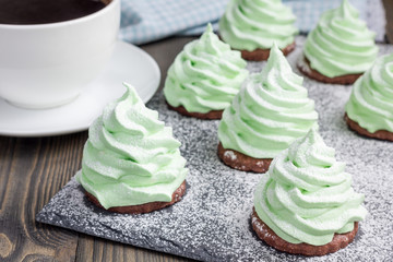 Homemade apple zefir fir-tree, placed on chocolate cookie