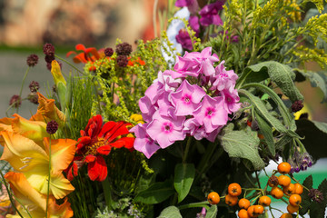 Naklejka na ściany i meble handmade beautiful bouquets from flowers and herbs