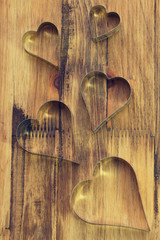 Heart on a brown wooden board