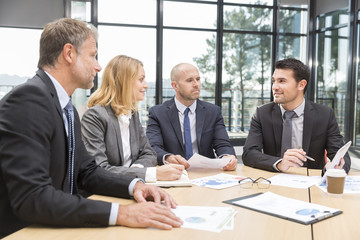 Group of business people having meeting in office