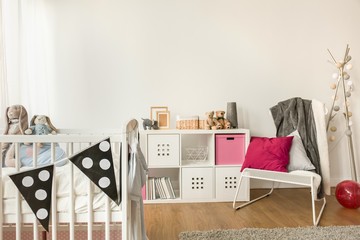 Baby furniture in girl's room