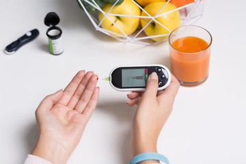 Naklejka premium Measuring blood sugar value