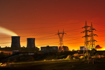 An industrial area of the metal industry in the sunset. Lights o