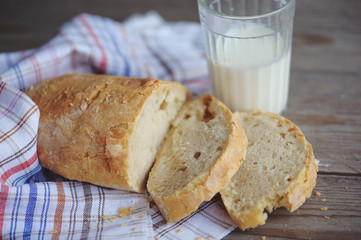 Bread and a glass of milk.