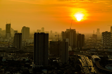 The view of Bangkok skyline at sunrise.