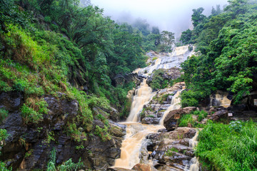 Fototapeta na wymiar Waterfall in the rocky hills of Sri Lanka