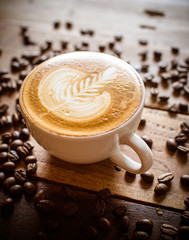 Cup of coffee latte in coffee shop