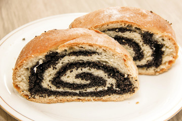 Roll with poppy seeds.