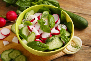 Fresh vegetable salad on table close up