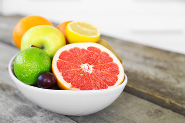 Fototapeta na wymiar Fresh fruits on table, close up