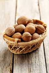 Walnuts on a grey wooden table