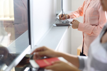 Airport Check-In Counters With Passengers
