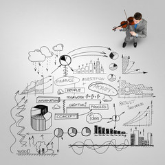 Naklejka premium Businessman play success melody