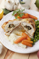 Chicken kiev with vegetables