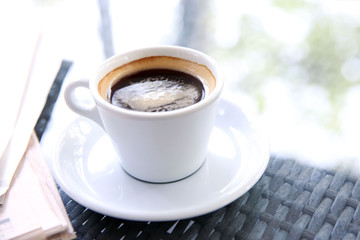 Cup of tasty coffee in cafe
