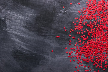 Red hearts against a dark background
