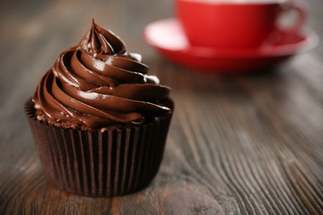 Chocolate cupcake on table