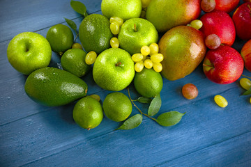 Fruits on dark blue wooden background