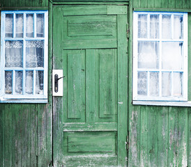 windows and door of an old house
