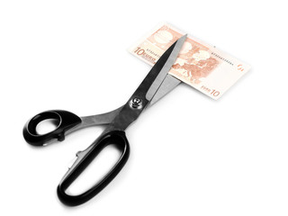 Scissors cut euro banknote, isolated on white