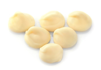 White chocolate morsels isolated on white