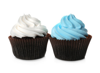Fresh delicious cupcakes in a row isolated on white background