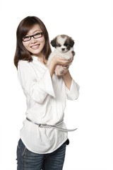Portrait of Young Woman with Shih Tzu Puppy