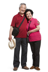 Portrait of senior couple travelling