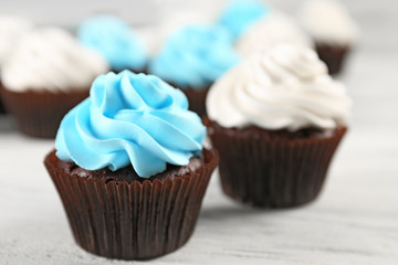 Cupcakes on wooden background