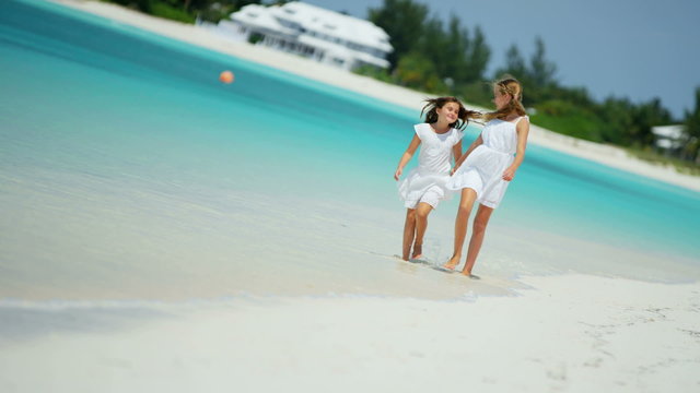 ocean leisure Caucasian young girls children travel vacation advertisement