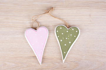 Hearts on wooden background