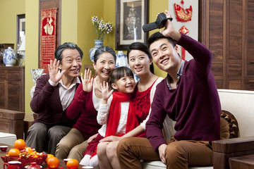 Family taking self portrait shots during Chinese New Year