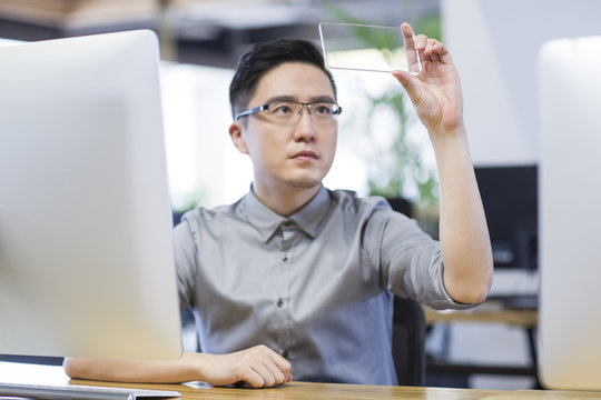 IT worker developing smart phone