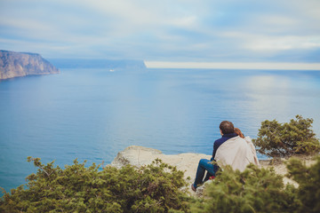 couple in love relaxing, mountain Coast