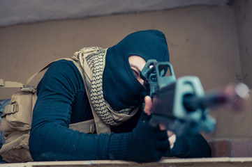 Man aiming with rifle