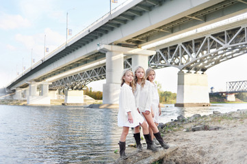 Portrait of three girlfriends on the nature