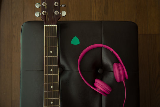 Guitar,plectrum and headphone 
