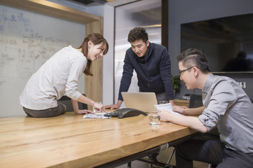 Business people having teleconference in board room