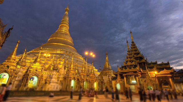 Time Lapse Night to Day Golden Shwedagon Pagoda Landmark Place Of Yangon Myanmar (tilt up)